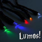 5 black magical wands with various coloured LED lights on the end.