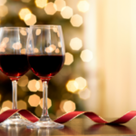 Two wine glasses on a table.